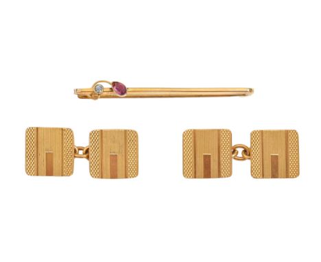 A pair of 9ct gold cufflinks, engine turned, 13 x 13mm, Chester 1935 and a ruby and white stone bar brooch, in gold marked 9c