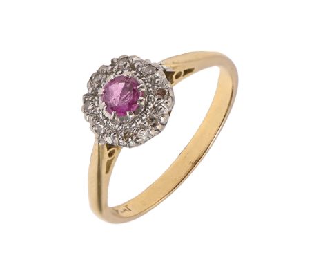 A ruby and diamond cluster ring, the gold hoop marked 18ct PLAT, 3g, size M Good condition
