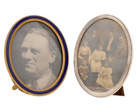A Victorian gilt brass and blue enamel photograph frame, oval, 16cm h, marked on strut PAYNE &amp; SON LOWNDES STREET SW and 