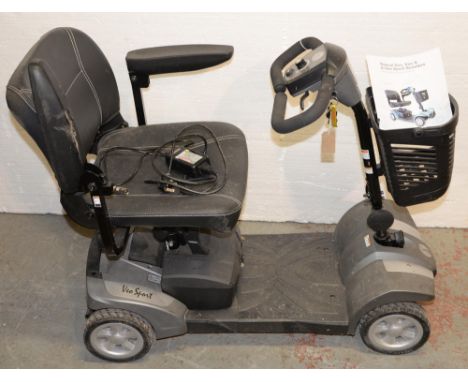 A Rascal VO Sport Mobility Scooter,&nbsp;with key, charger and instruction booklet Untested, dust and dirt but no obvious dam