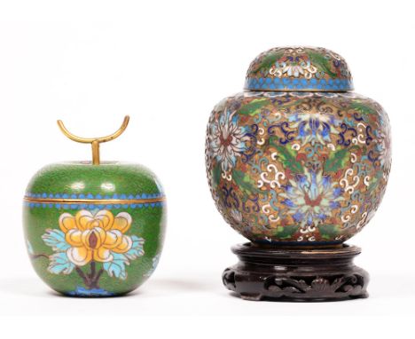 A Japanese cloisonne enamel jar and cover on pierced wood stand, early 20th c, 12cm h, and another, later, in the form of an 
