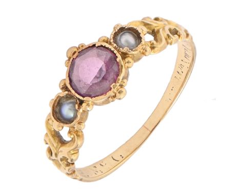 A Victorian amethyst and split pearl ring, in gold, with pierced and chased shoulders and fluted hoop, 1.7g, size J Inner sid