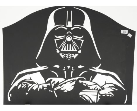 Star Wars. A pierced metal Darth Vader firescreen, 60cm x 76cm 