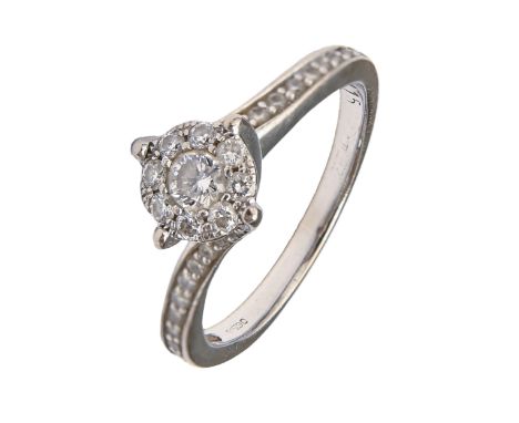 A diamond ring, with diamond shoulders, in 18ct white gold, 3.6g, size J Light wear