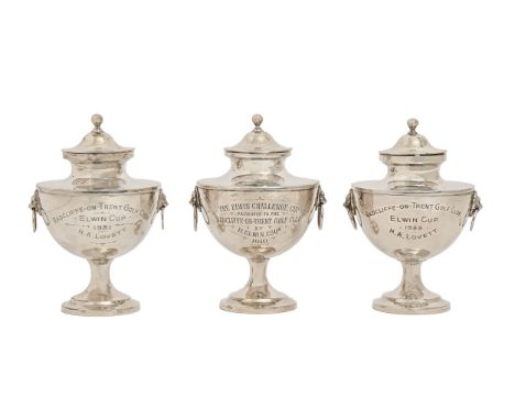 Three George V silver trophy cups and covers, with lion mask and ring handles, engraved inscriptions prizes of Radcliffe on T