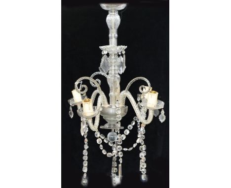 An Eastern European moulded glass four light chandelier, 20th c,&nbsp; 60cm h Parts detached but basically complete, dusty