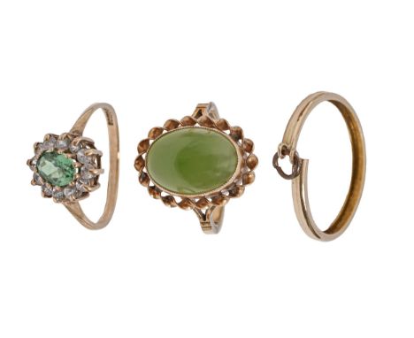 A jade ring, in 9ct gold, another gem set ring and a gold coin mount, 6.8g, ring size M and N (3) Hoop of one ring bent