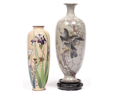 A Japanese cloisonne enamel oviform vase, early 20th c, 33cm h, with a bird of prey in a blossoming tree, on carved and pierc