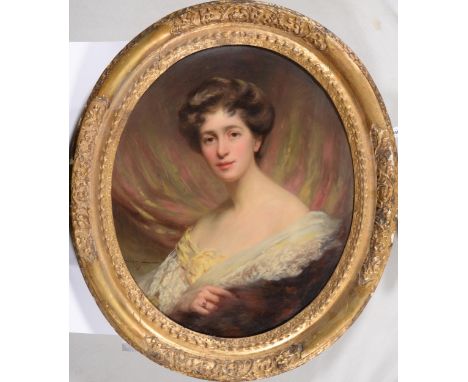 John St. Helier Lander ROI (1868-1944) - Portrait of Margaret Fanny Salome McGarvey, bust length wearing a ruby ring, signed 