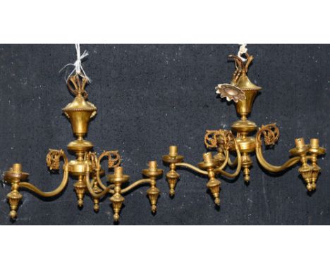 A pair of lacquered brass five light chandeliers, 20th c,&nbsp; 44cm h Lacquer discoloured and dirty
