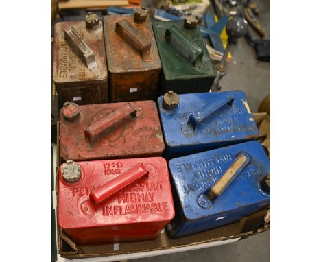 Vintage Motoring. Seven&nbsp;Shell, Esso, Pratt and other&nbsp;petrol cans,&nbsp; with brass caps, one stamped broad arrow WD
