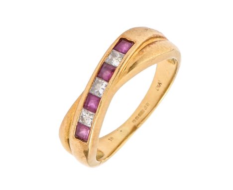 A ruby and diamond crossover ring, with calibre cut rubies and princess cut diamonds, in 18ct gold, import marked London, pro