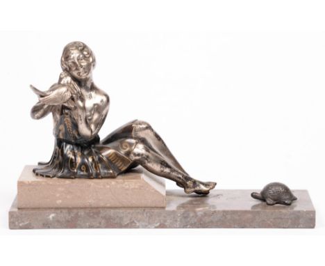 An art deco spelter statuette of a woman with a chicken and tortoise, c.1930, on marble base, 32cm l 