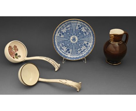 A Wedgwood 'rosewood' glazed and gilt Doric jug, late 19th c, 15.5cm h, impressed marks, a Wedgwood Queen's ware soup ladle a