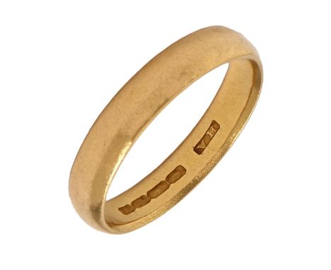 A 22ct gold wedding ring, Birmingham 1933, 5.4g, size R Light scratches