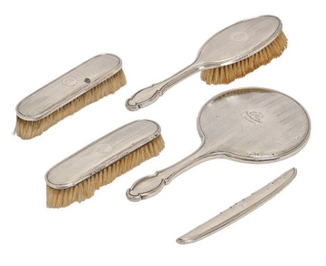 A George V five-piece silver brush set, engine turned, by John Thompson &amp; Sons, Birmingham, 1921 and 1922 Wear and some d