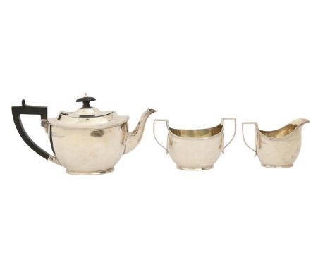 A George V silver tea service, of plain oval shape with reeded rim, teapot 13cm h, by Barker Brothers, Chester 1918, 27ozs 8d
