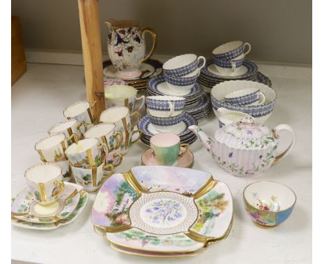 A Copeland Spode porcelain part tea set and two dishes, painted with scenes after Birkett Foster, a blue and white teaset and