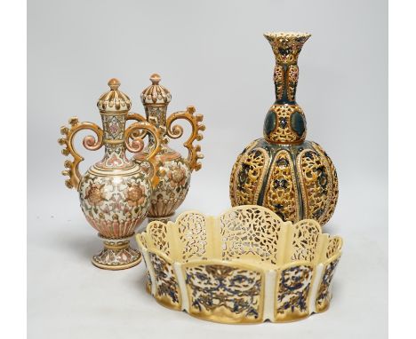 Hungarian pottery comprising pair of Zsolnay vases and covers, a pierced vase and a dish, 30cm high The pair both structurall