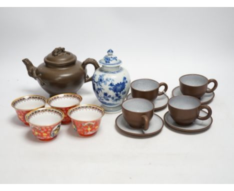 A Chinese blue and white tea caddy, four tea bowls, four cups and saucers and a teapot, largest 17cm high