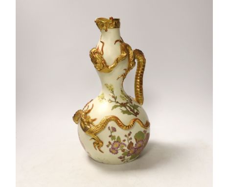 A Royal Worcester ewer with dragon handle, numbered 1035, 29cm high Shallow flake to enamel and gilding at edge of serpent ha