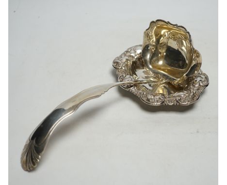 A Dutch white metal soup ladle, 29.5cm and a sterling small dish, 9.3oz.