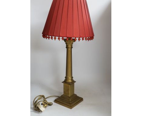 A brass column table lamp, 65cm high