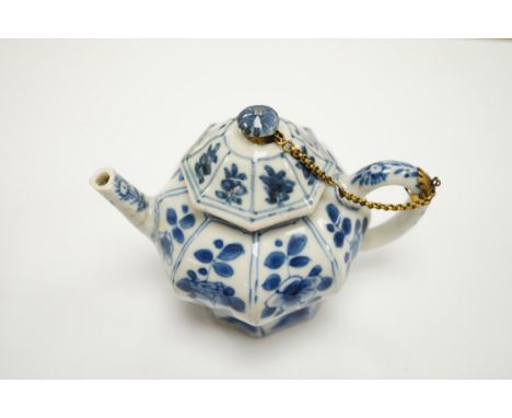 A Chinese blue and white octagonal teapot and cover with gilt metal mounts and a blue and white baluster vase, 16.5cm high, b