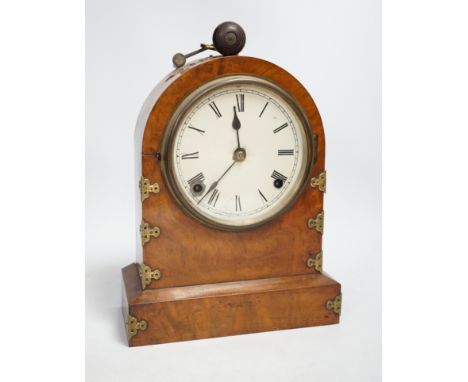 A Victorian walnut and brass mounted mantel clock, 26cm high