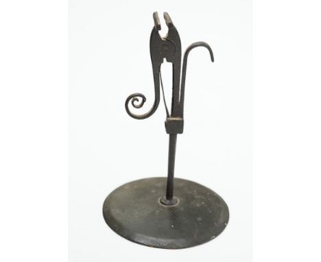 A late 18th century rush light, 15.5cm high The holder is in generally good condition however the spring no longer functions 