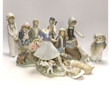 Ten Lladro and Nao figures including a short eared owl and a girl with braids, largest 26cm high