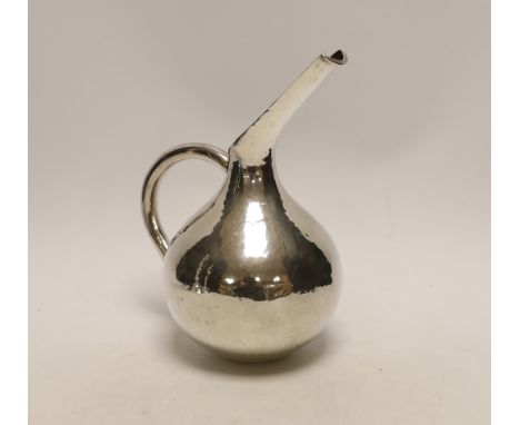 A Cypriot 925 milk pitcher, with elongated spout, height 20.3cm, 8.9oz.