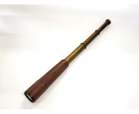 A large four drawer brass and leather telescope, Cornwall. 80cm extended. 26cm closed. Lens 6cm diameter.