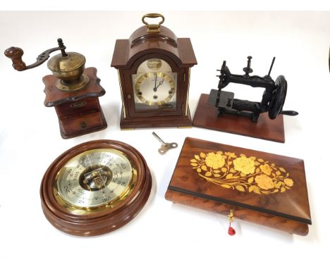 A collection including a Tempus Fugit clock, a Rhenania coffee grinder, a barometer, a jewellery box, and a sewing machine