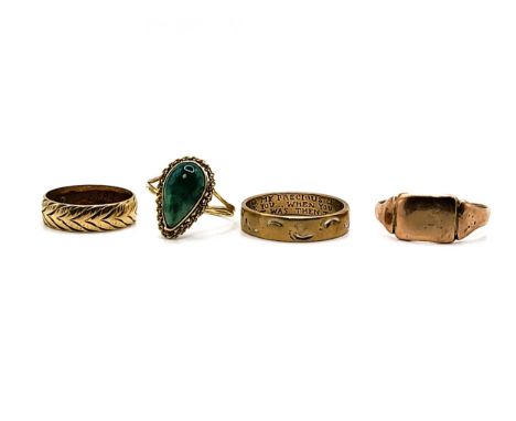 A 14k yellow gold split mount ring with a twisted chain surrounded mount set with a composite stone size N 2.3gms, a 9ct yell