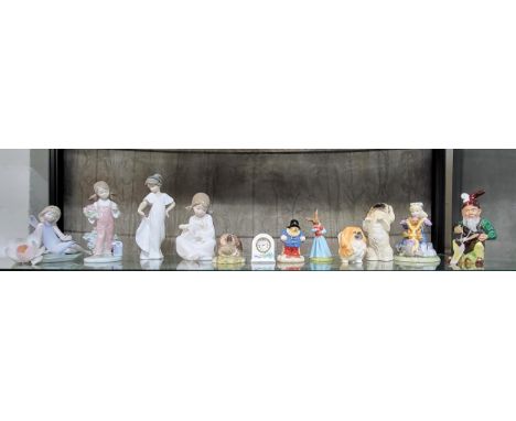 Two Lladro figures of girls (one with fractured flower petals), two Nao figures of young girls, Aynsley clock, and seven figu