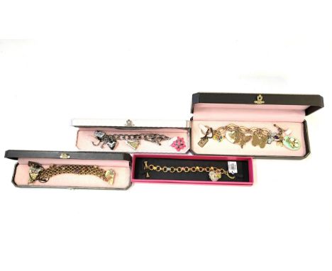 A Juicy Couture charm bracelet with five charms including a converse, a heart, a twirling baton, and a bow, a Juicy Couture t