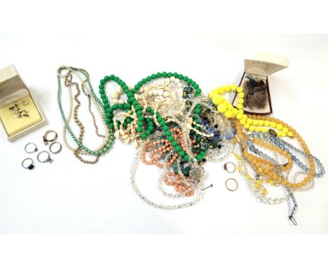 A selection of costume jewellery including a pair of faux pearl earrings, boxed, paste brooches and necklaces, faux pearl nec