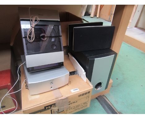 A boxed Pioneer XC-F10 wall mounting CD player, M-F10 power amplifier and SF-10 speakers and woofer, with remote, manuals etc