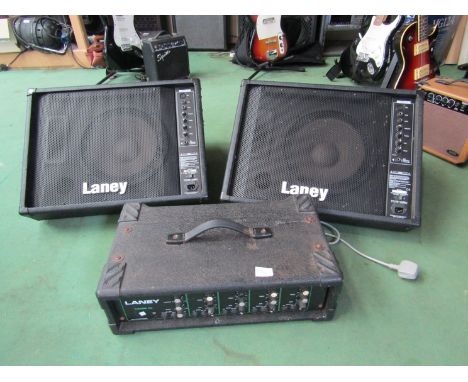 A pair of Laney CP1 wedge monitor speakers and a Laney Theatre 750 amplifier