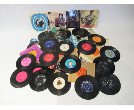 A collection of predominantly 1960's 7" singles and EP's including The Beatles, Fats Domino 'Red Sails In The Sunset', Elvis 