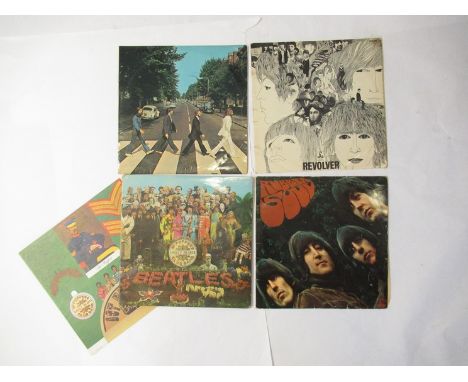 THE BEATLES: Four LP's to include 'Sgt. Peppers Lonely Hearts Club Band', 'Revolver', 'Abbey Road' (misaligned Apple logo, 'H