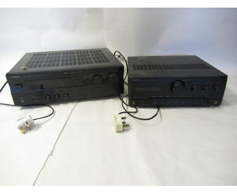 A Kenwood integrated amplifier and a Yamaha AV reciever
