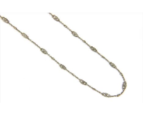 A platinum diamond chain, rose cut diamonds milligrain set to plain collets, alternating with scroll links, joined by lengths