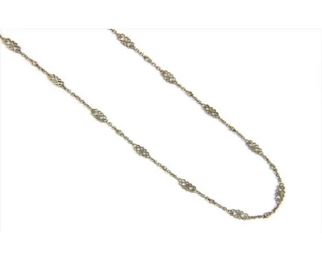 A platinum diamond chain, rose cut diamonds milligrain set to plain collets, alternating with scroll links, joined by lengths