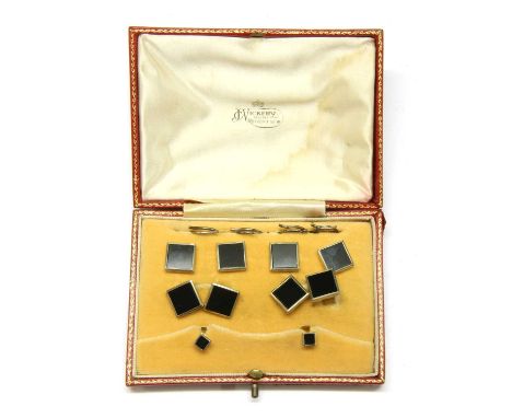 A cased onyx dress set, with a pair of chain link cufflinks, each face a square onyx plaque, with a matching set of four dres