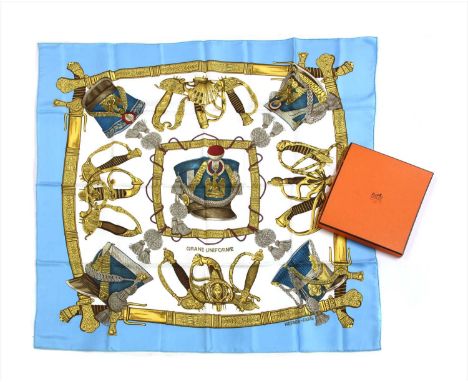 An Hermès Scarf, 'Grand Uniforme', by Joachim Metz, 1985, white ground with blue border, military design, in box