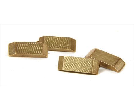 A pair of 9ct gold cufflinks, rectangular faces with engine turned decoration and plain bevelled edges, with chain link fitti
