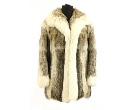A coyote fur jacket , with fox fur cuff and collar, size not stated, approximate size 10