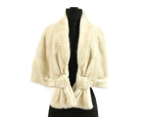 A Christian Dior cream mink fur stole, with hook front closure and silk lining